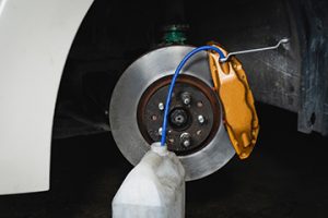 Car,Brake,Fluid,Bleeding,Service,In,Garage,Service,Shop. - Meineke California Meineke Car Care | Bleeding Brakes | Fairfield CA