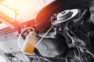 Car,Service,,Closeup,Process,Changing,Brake,Fluid. - Meineke California Meineke Car Care | Bleeding Breaks | Modesto
