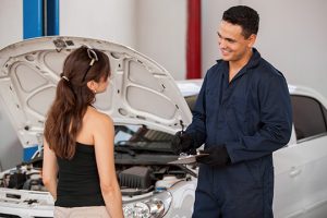 Woman with Mechanic - Meineke California Meineke Car Care | ASE Certified | Riverside